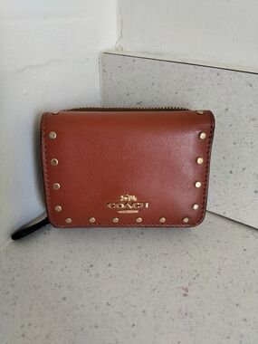 Coach Studded Leather Zip Wallet in Rust